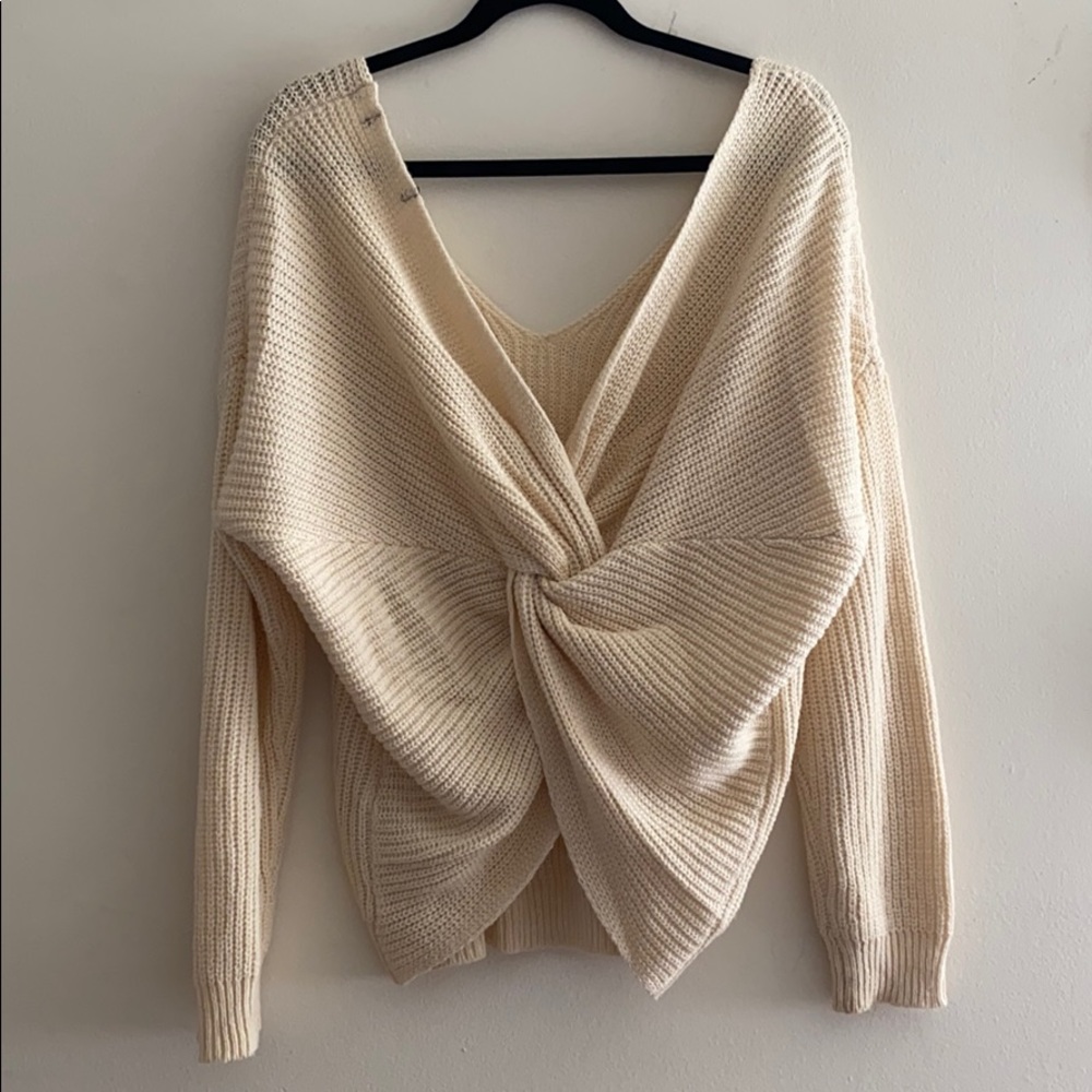 Cream twist back cable knit sweater
